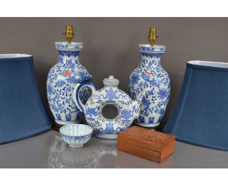 A pair of modern Chinese blue and white porcelain lamps and shades, together with a modern Chinese porcelain loop teapot and 