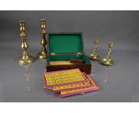 A Victorian mahogany workbox containing a 20th Century Mahjong set, together with two pairs of brass candlesticks