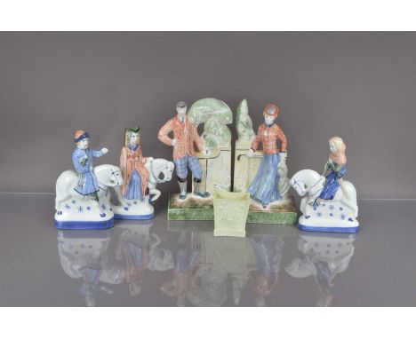 Five modern Rye Pottery figurines and a Sowerby style glass vase, including a golfer and his female companion, 29cm, three fi