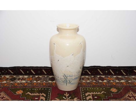 A first half 20th century Japanese earthenware crane design vase, 58cm high with three character to baseThe vase is in good c