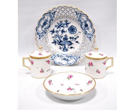 Pair of Meissen lidded cups and saucers and another dish, all decorated with roses, also a ribbon plate. 