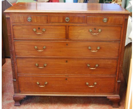 19th century mahogany chest, the moulded rectangular top over three frieze, two short and three graduated long drawers flanke