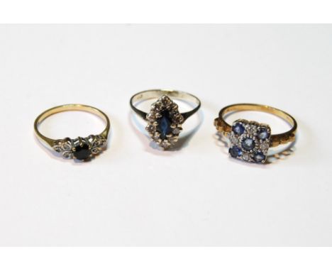 Diamond and sapphire marquise cluster ring, another, pale blue, and a similar smaller ring, all 9ct gold.&nbsp; (3) 