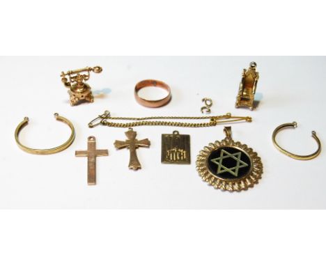 Two gold coin mounts, two charms, a band ring, two crosses and various items, all 9ct, 22.5g gross.