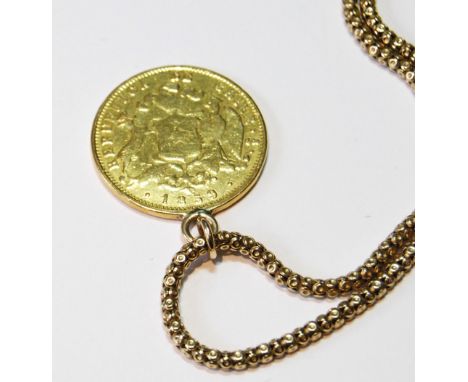 Chile gold 10 pesos with soldered ring and 9ct gold necklet, 25g gross, the coin 15.4g. 