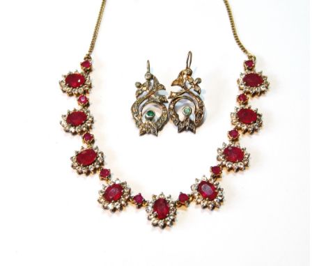 Silver gilt necklace with graduated ruby and white sapphire clusters, also a pair of similar drop earrings with emeralds and 