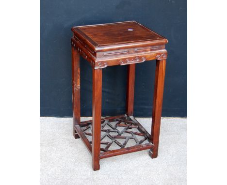 Early 20th century Chinese side table with scroll detail on square supports, 43cm wide, 76cm high and 43cm deep. 