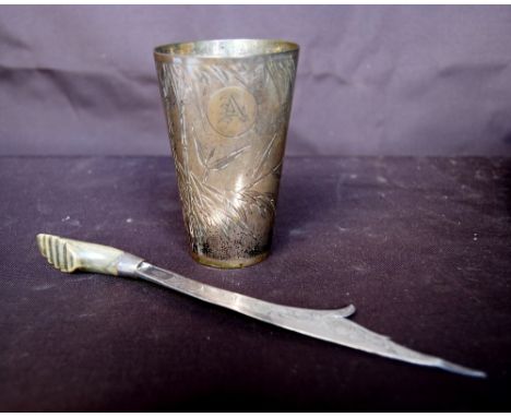 Chinese silver beaker decorated with bamboo, 10cm high, also a horn-handled letter opener.&nbsp; &nbsp;(2) 