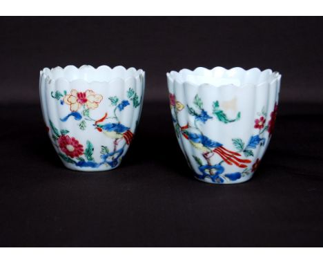 Pair of Chelsea raised anchor period beakers, c.1750/1752, each of fluted form with lobed rim, polychrome decorated with an e