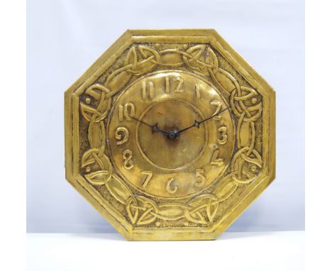 Aesthetic Movement Wag at the Wa brass clock, the octagonal face with Arabic numerals and interlaced decoration, 36cm wide. 