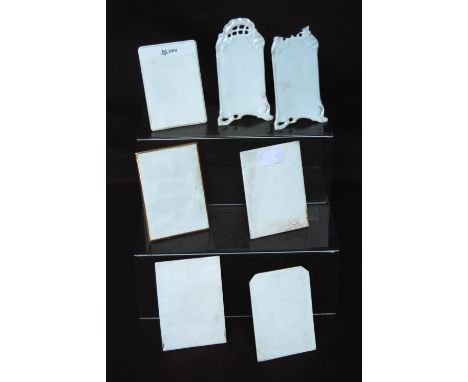 Shelley white glazed menu holder of rectangular easel form and six others similar.&nbsp; (7) 