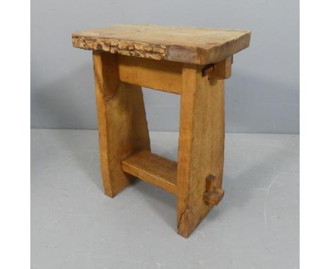 A vintage rustic mixed timber stool of pegged construction. Width 42cm, Height 52cm, Depth 24cm.