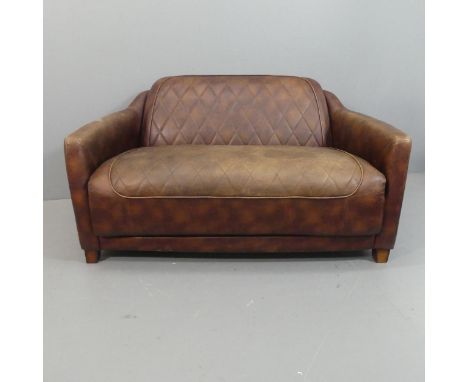 A mid-century design leather upholstered two-seater sofa, in the manner of Timothy Oulton.Overall width 135cm, height 77cm, d