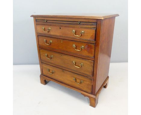 A Georgian style bachelor's chest of four long drawers with brushing slide and bracket feet. Width 77cm, height 84cm, depth 4