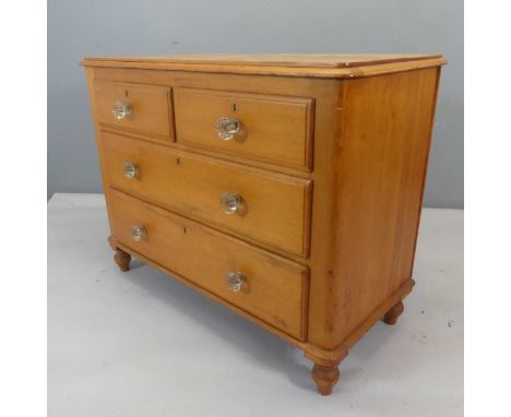 A vintage pine chest of two short and two long drawers. Width 102cm, height 78cm, depth 50cm.