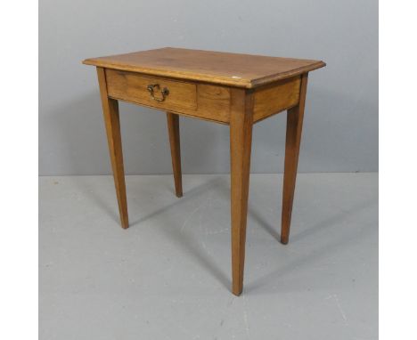 A vintage oak writing table, with single drawer and square tapered legs. Width 77cm, height 76cm, depth 45cm.
