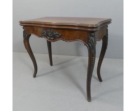 A 19th century Rosewood fold-over card table, with applied carved decoration and raised on cabriole legs. Width 86cm, height 
