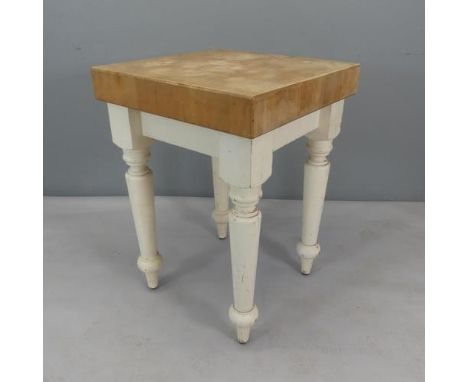 A vintage square pine topped butcher's block on painted base. Width 62cm, height 88cm.