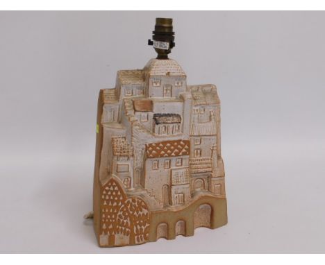 A Tremaen, Newlyn pottery lamp base depicting village, 12.75in tall 