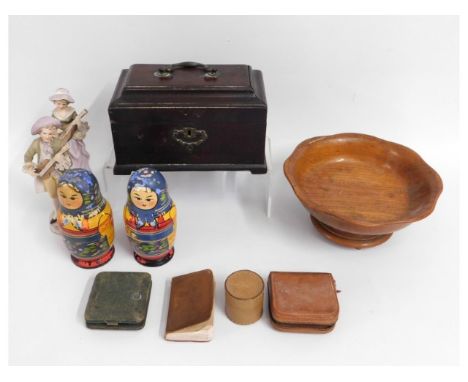 A 19thC. caddy, lacking lining, twinned with two Russian graduated dolls, two bisque figures, a musical bowl &amp; other item