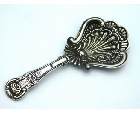 An 1836, William IV Birmingham silver caddy spoon by Taylor &amp; Perry, dent to handle, 12.7g