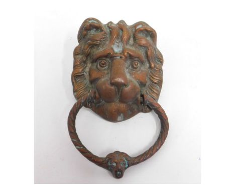 A bronze lion head door knocker, 7.5in high inclusive 