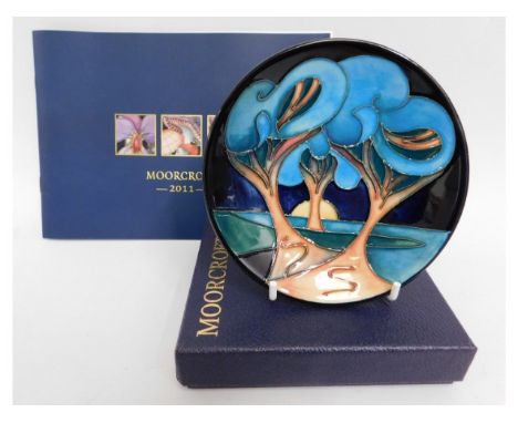 A boxed Moorcroft pottery trinket dish, "Moonlight Sonata"