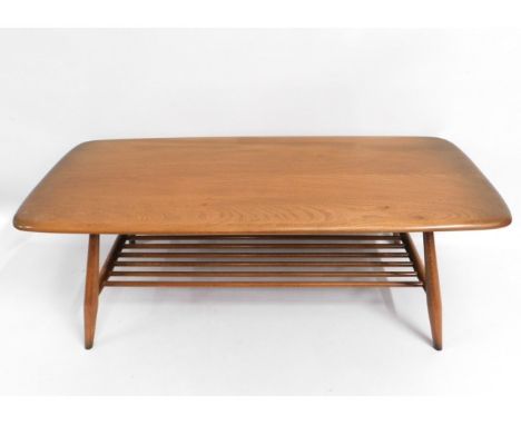 An elm Ercol coffee table, 40in wide x 18in deep x 14.5in high 