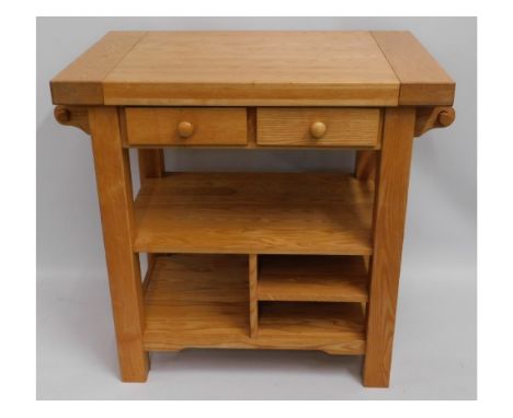 A compact, oak butchers block with drawers, 38.5in wide x 35.5in high x 17.5in deep