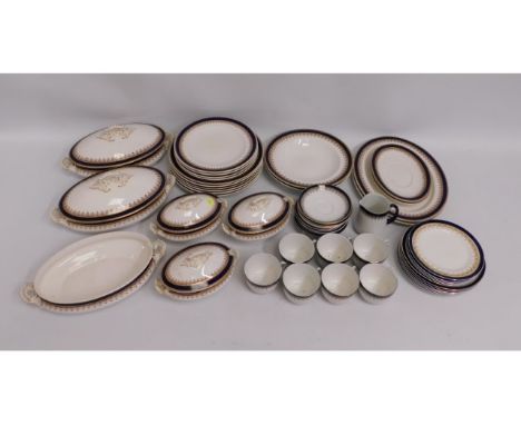 A matched part dinner service including Royal Worcester, Alfred Meakin &amp; Royal Doulton