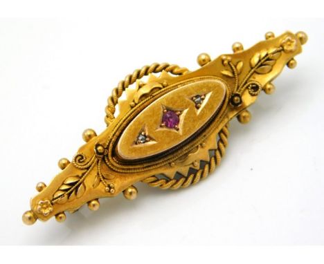 A 15ct Frederick Banks Chester gold memorial brooch set with diamond &amp; ruby, 4.3g