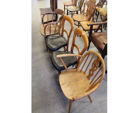 Two leather seated chairs, Ercol carver and other