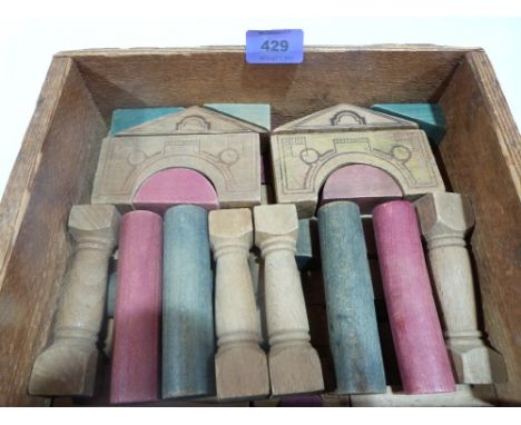 A box of early 20th century architectural building bricks