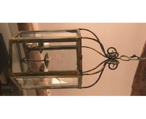 A metal hexagonal three candle light hall lantern. Two glass panes A.F.