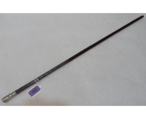A military swagger stick, the pommel with embossed armorial for Volunteer Battalion The Buffs 