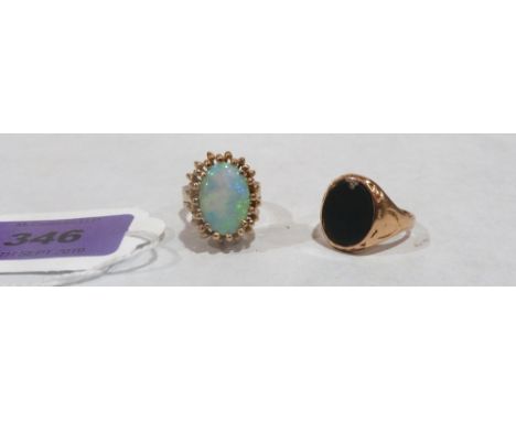 A 14ct opal dress ring 10.1g gross and a yellow metal signet ring