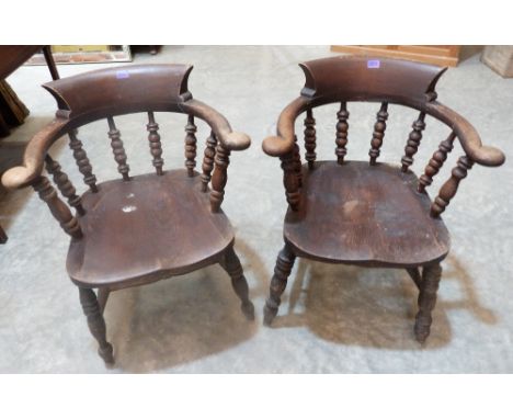 Two Victorian smoker's bow elbow chairs