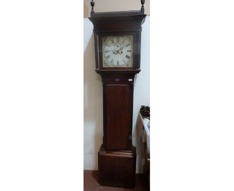 A late 18th century oak and mahogany longcase clock with 8 day movement, the dial painted with roses to the spandrels. 85' hi