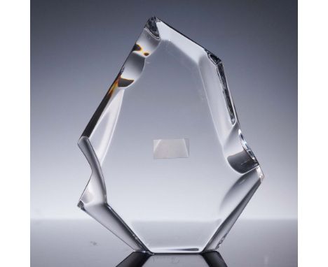 Elegant Baccarat crystal paperweight modeled in the form of an abstract iceberg, featuring sharp faceted edges and a sculptur