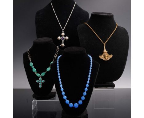 Group of four diverse costume necklaces including a strand of graduated opaque blue beads with crystal spacers, and a strikin