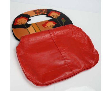 Vintage Moon Bags purse by Patricia Smith Designs, Milwaukee, dated 1980. Features a bold red body with a distinctive handle 