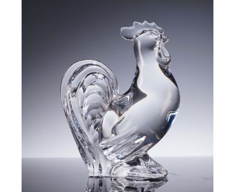 This Baccarat crystal rooster figurine captures the proud stance and fine plumage of the iconic bird with striking clarity an