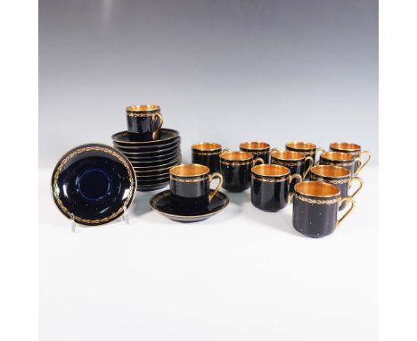 Elegant 24 piece Arabia Finland demitasse set featuring a deep cobalt blue glaze with gold accents. This set includes 12 demi