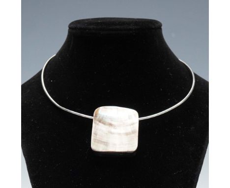 Contemporary silver tone choker necklace featuring a sleek collar design with a hook-and-ball clasp and a large, rectangular 
