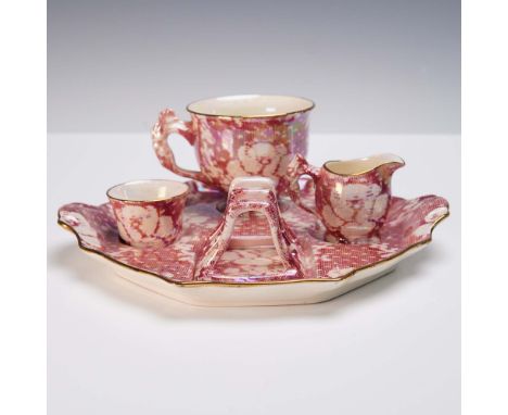 The set features an iridescent deep pink ground with an allover transfer of white roses and gilt trim on all edges. The colle