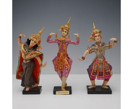 Set of three handmade Thai Khon dancer dolls, dressed in traditional classical dance costumes. Each figure is elaborately cra