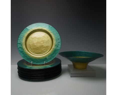 This striking 12-piece set by Portmeirion Studio Glass includes 11 charger plates and one wide serving bowl, all crafted in a