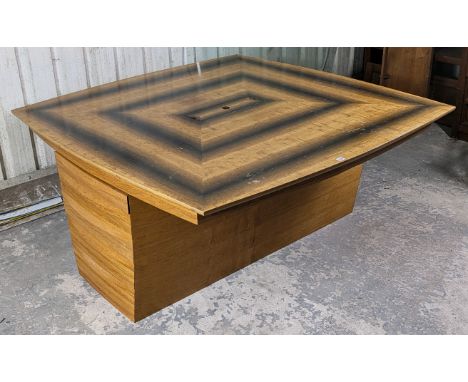 A MATTHEW BURT LIGHT OAK &amp; MAHOGANY-FINISH DESK with a square top, fitted five long graduated drawers to either end &amp;