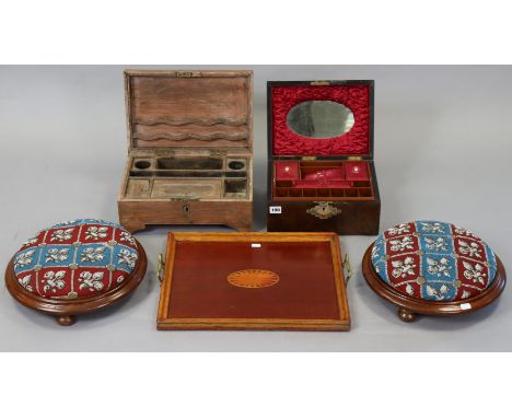 A pair of Victorian walnut circular footstools each with a bead embroidered seat; together with two trinket boxes; two tea tr