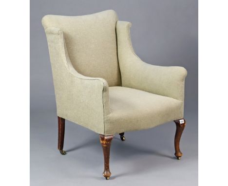 A&nbsp;late 19th/early 20th century easy chair upholstered light grey material, on short cabriole legs with pad feet and bras